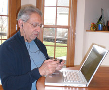Too old to multitask? The author texting while writing on a laptop and listening to tunes.