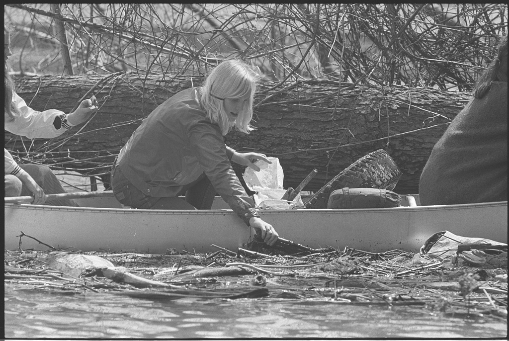 Girl Scout in canoe, picking trash out of the Potomac River during Earth Week. O'Halloran, Thomas J., photographer 1970 April 22. Courtesy of Library of Congress
