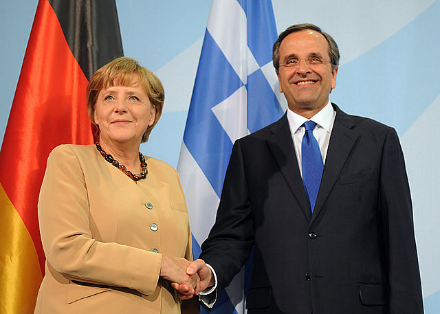 Angela Merkel - Αντώνης Σαμαράς, 2012. Photo by Αντώνης Σαμαράς Πρωθυπουργός της Ελλάδας. CC BY-SA 2.0 via Wikimedia Commons. 