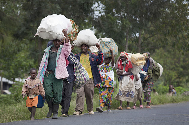 Population fleeing their villages due to fighting between FARDC and rebel groups, Sake North Kivu, 30 April 2012. Photo by MONUSCO/Sylvain Liechti CC BY-SA 2.0 via Wikimedia Commons