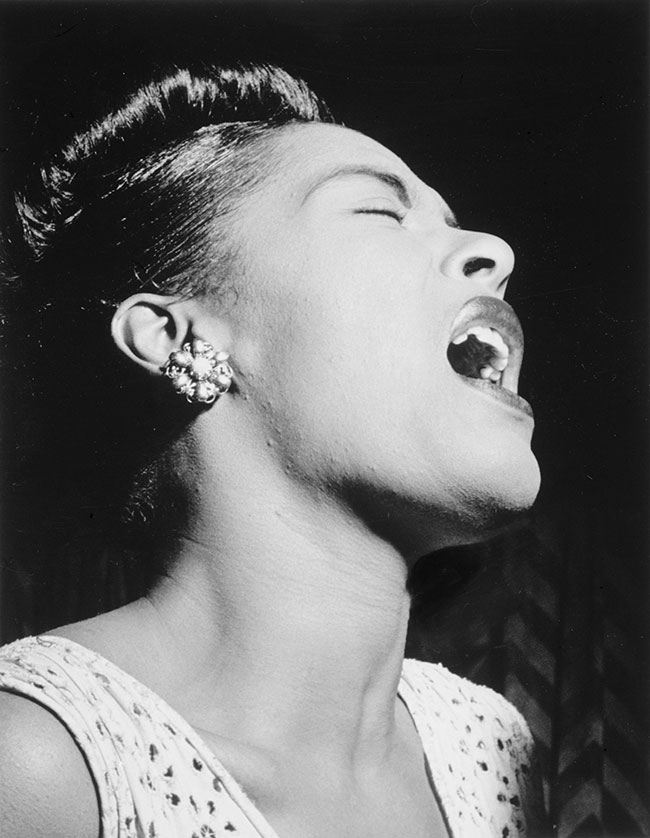 Billie Holiday by William P. Gottlieb. Public domain via Wikimedia Commons.
