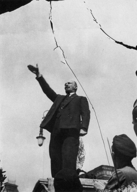A visionary.     (Lenin  making a speech in the Red Square at the unveiling of a temporary monument to Stepaz Razin in 1919. Photo by G.P.Goldshtein. Public domain via Wikimedia Commons. 