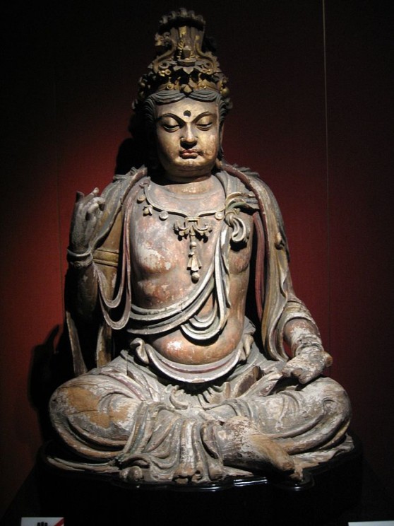 A seated wooden Bodhisattva statue, Jin dynasty (1115–1234), Mountain at Shanghai Museum. CC BY-SA 3.0 via Wikimedia Commons.