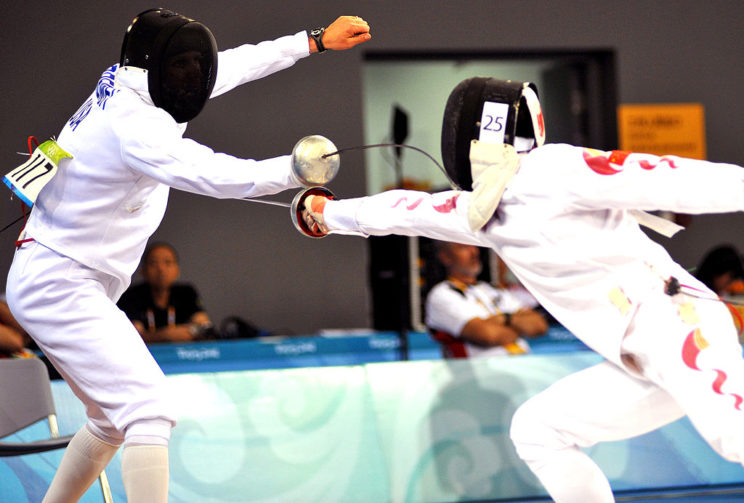 'Eli Bremer in 2008 Summer Olympics modern pentathlon fencing event' by Tim Hipps. Public Domain via Wikimedia Commons.