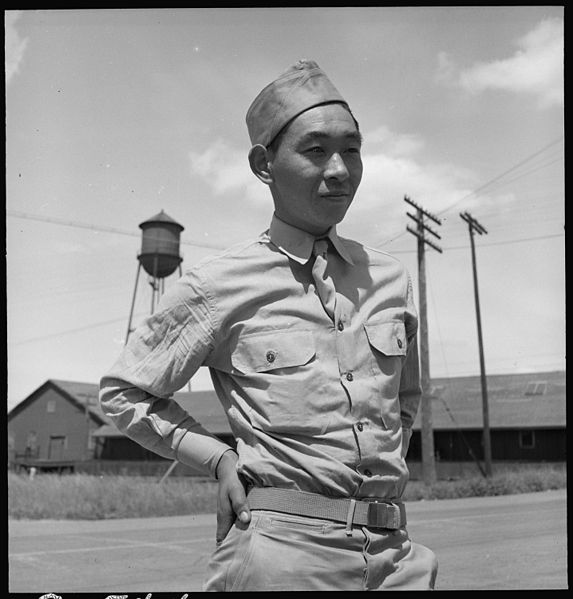 A young Japanese American soldier, given leave to assist his family with relocation.