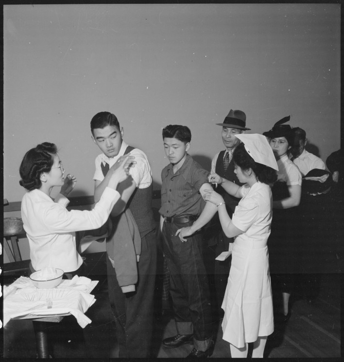 Japanese Americans being inoculated as they registered for evacuation in San Francisco.