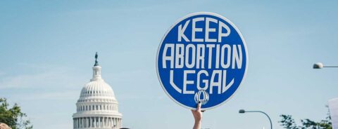 A photo of a protest sign that says "keep abortion legal" in front of the US Capitol building. "Is a 15-week limit on abortion an acceptable compromise?" by Bonnie Steinbock on the OUP blog