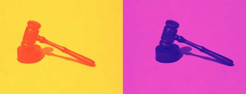 Two gavels on yellow and pink backgrounds to illustrate the blog post "Much ado about nothing? The US Supreme Court’s Warhol opinion" by William Patry on the OUP blog