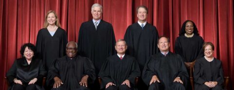 Photo of nine judges of the Supreme Court of the United States in 2022 to illustrate the blog post "The contested nature of religious liberty in today’s America" by Mark Valeri on the OUP blog