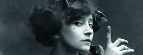 Black and white image of Colette posing for a picture
