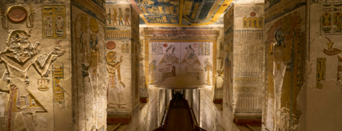 Long hallway with paintings & hieroglyphs on walls in Tomb KV9 in Egypt's Valley of the Kings for Pharaohs Ramesses V and VI