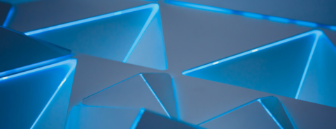 Futuristic blue tessellating 3D triangles