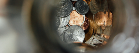 shallow focus photography of coin collection