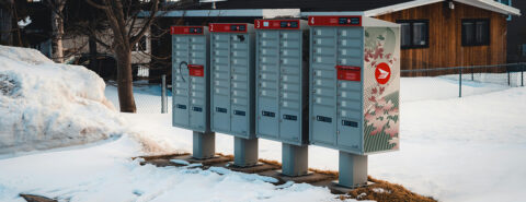 Canada Post Community Mailboxes on Sidewalk in Snow